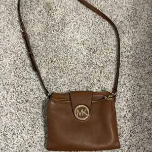 Gently used, very spacious Michael Kors crossbody purse